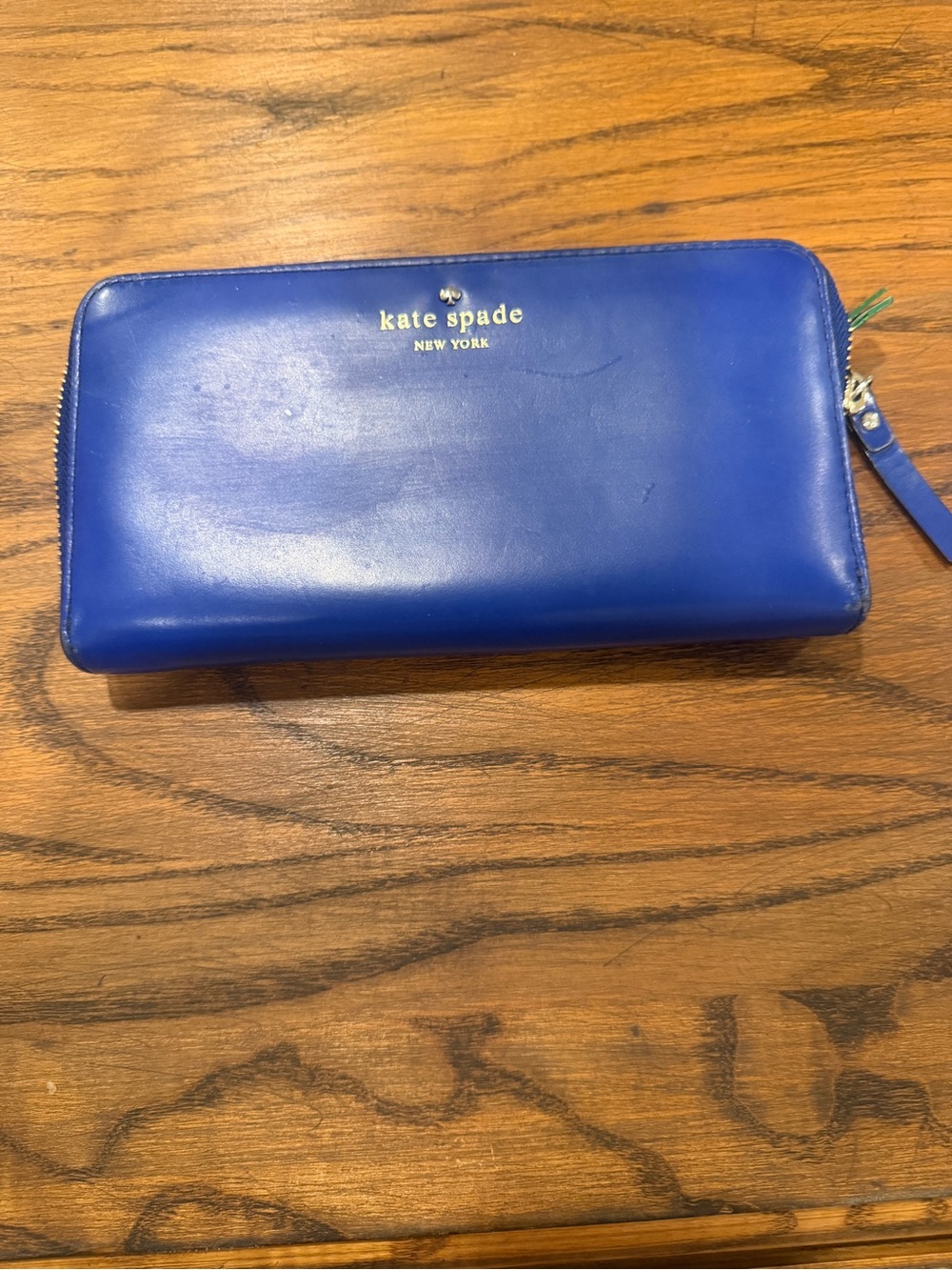 kate spade cobalt blue zip-around wallet